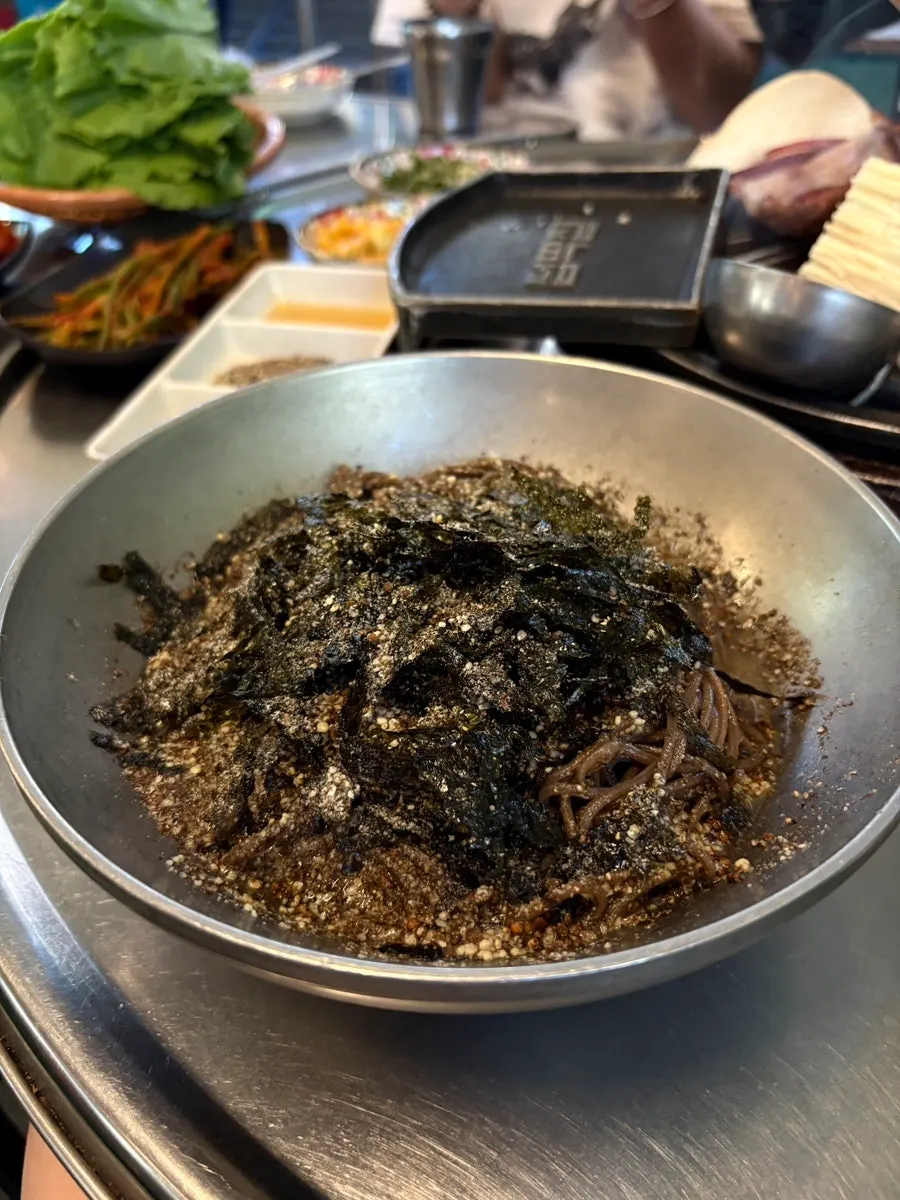 Haenam aged kimchi grilling on the pan with meat