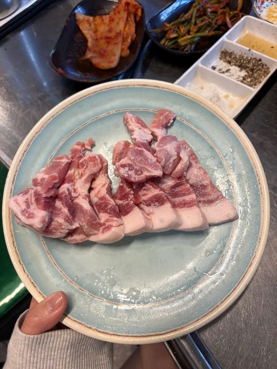 Lettuce wrap combining grilled meat and perilla oil noodles