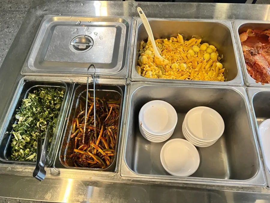 Self-serve bar at Neopttakjip where diners refill side dishes