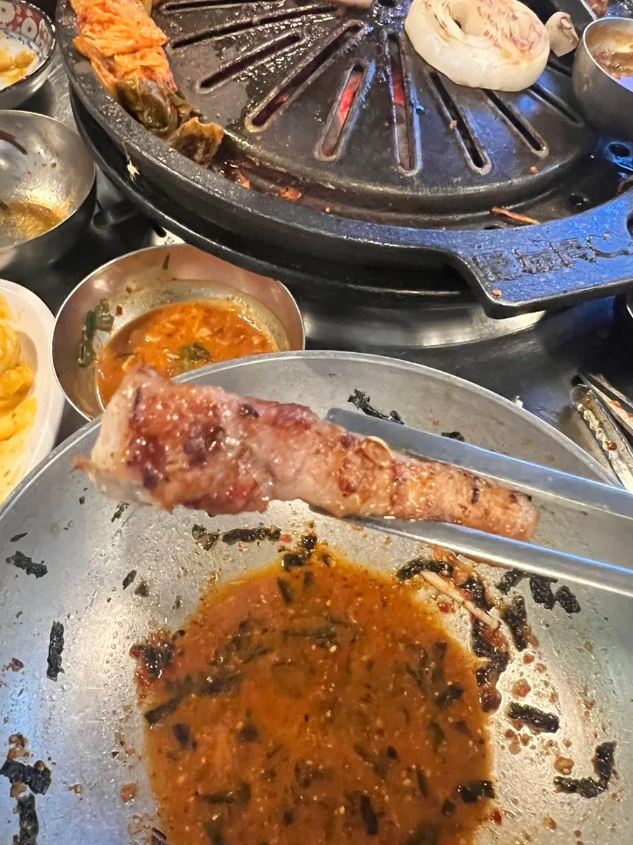 The various cuts of the mixed grill laid out after grilling