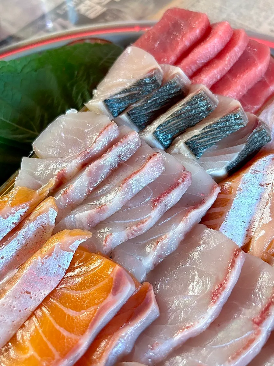 A savory bite of aged mackerel sashimi