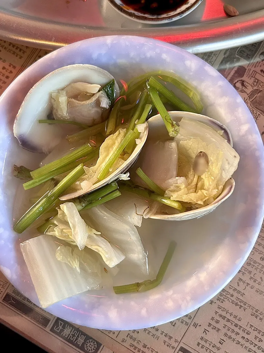 Clam soup broth with napa cabbage and minari