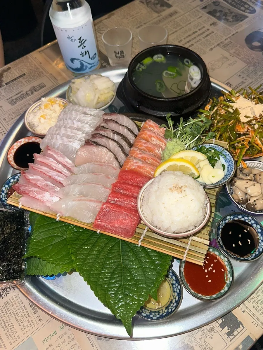 Menu board listing steamed seafood and soup dishes