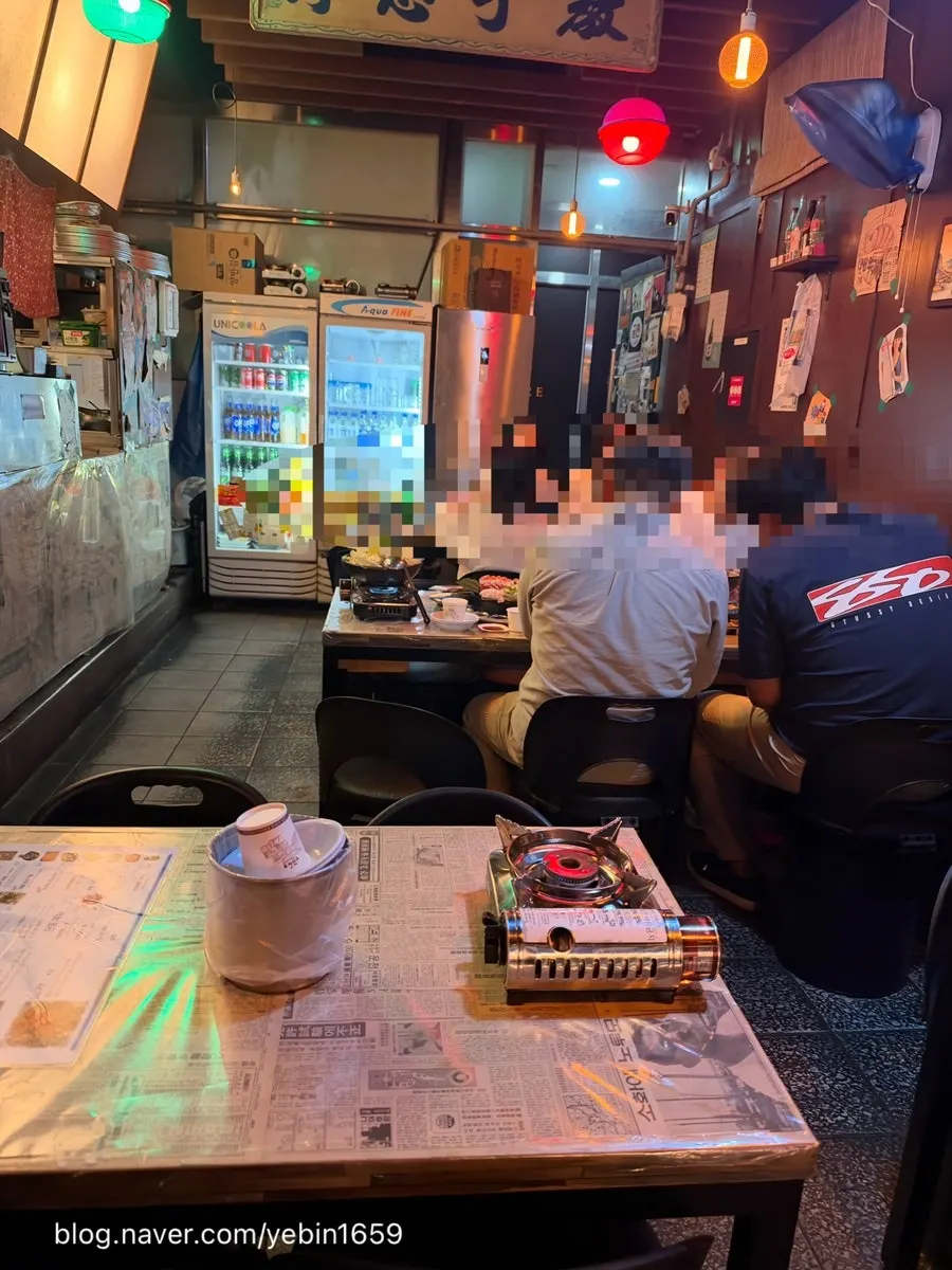 Outdoor tables lit up after sunset