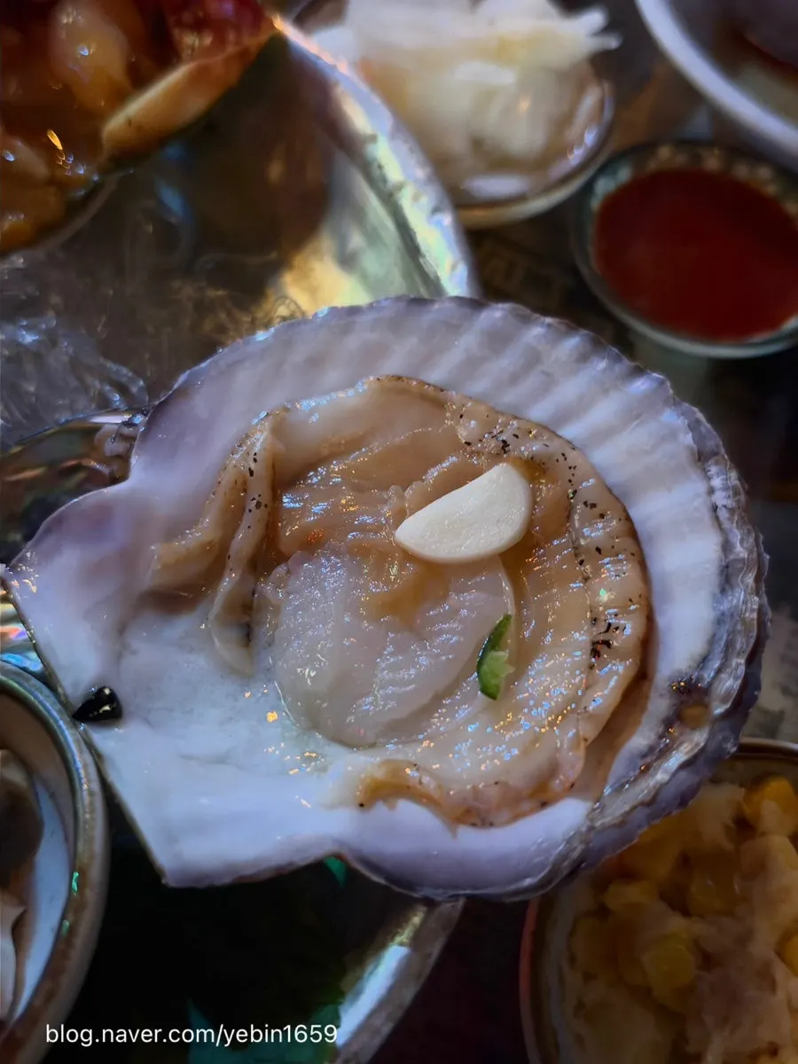 Close-up of a plump scallop with a full adductor muscle