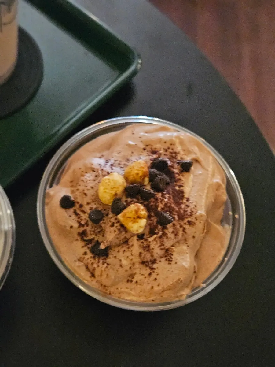 A spoonful showing custard cream, banana, and egg cookies
