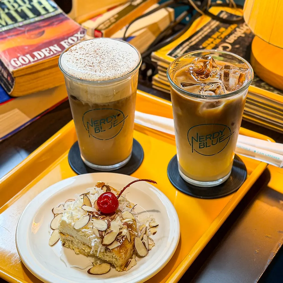 A table spread with ordered drinks and dessert