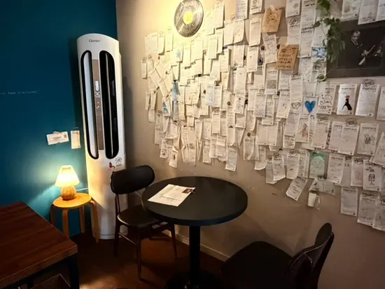 Cafe wall decorated with LPs and drawings