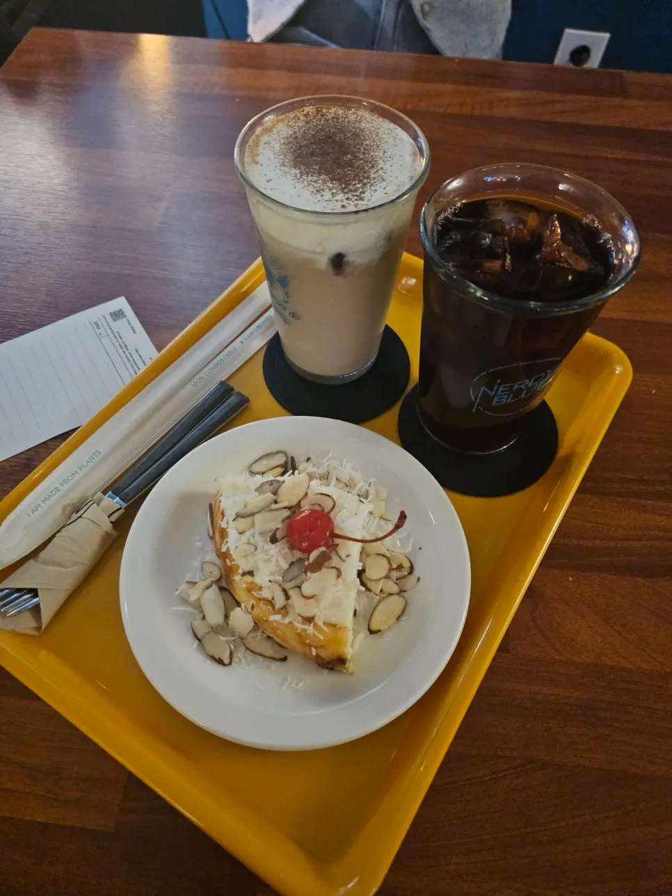 Café table with coffee and dessert together