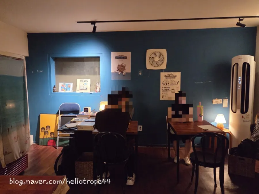 Cozy café interior with mostly two-seat tables