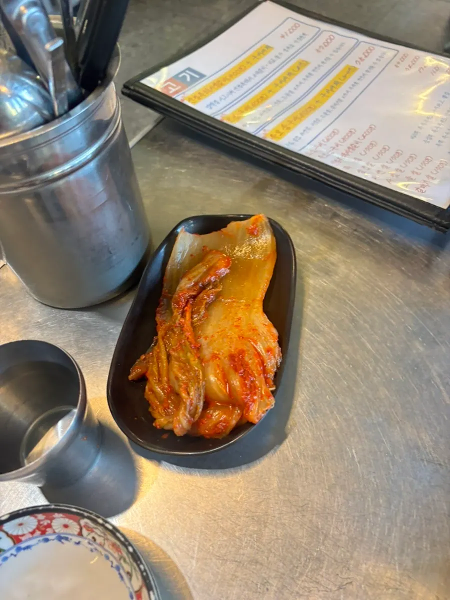 Table and grill plate at Neopttakjip Samsong Branch