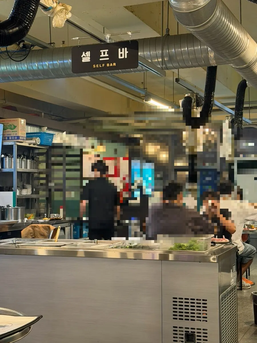 Interior of Neopttakjip Samsong Branch with an outdoor-tent feel