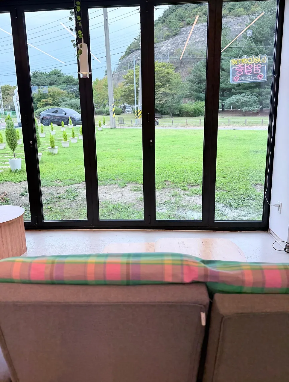Garden and mountain view through Nillai's floor-to-ceiling windows