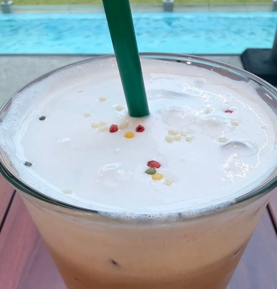 The signature Nillai latte topped with rice cream