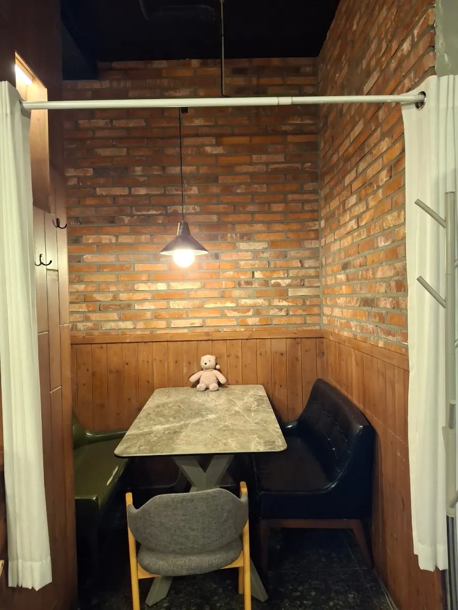 Board game seating with curtains that can be drawn