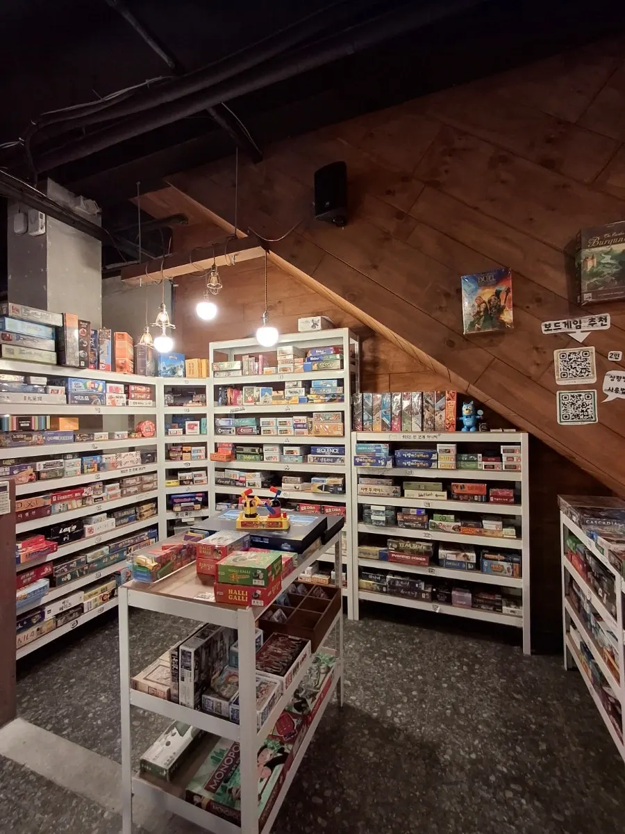 Shelves displaying board games in the store