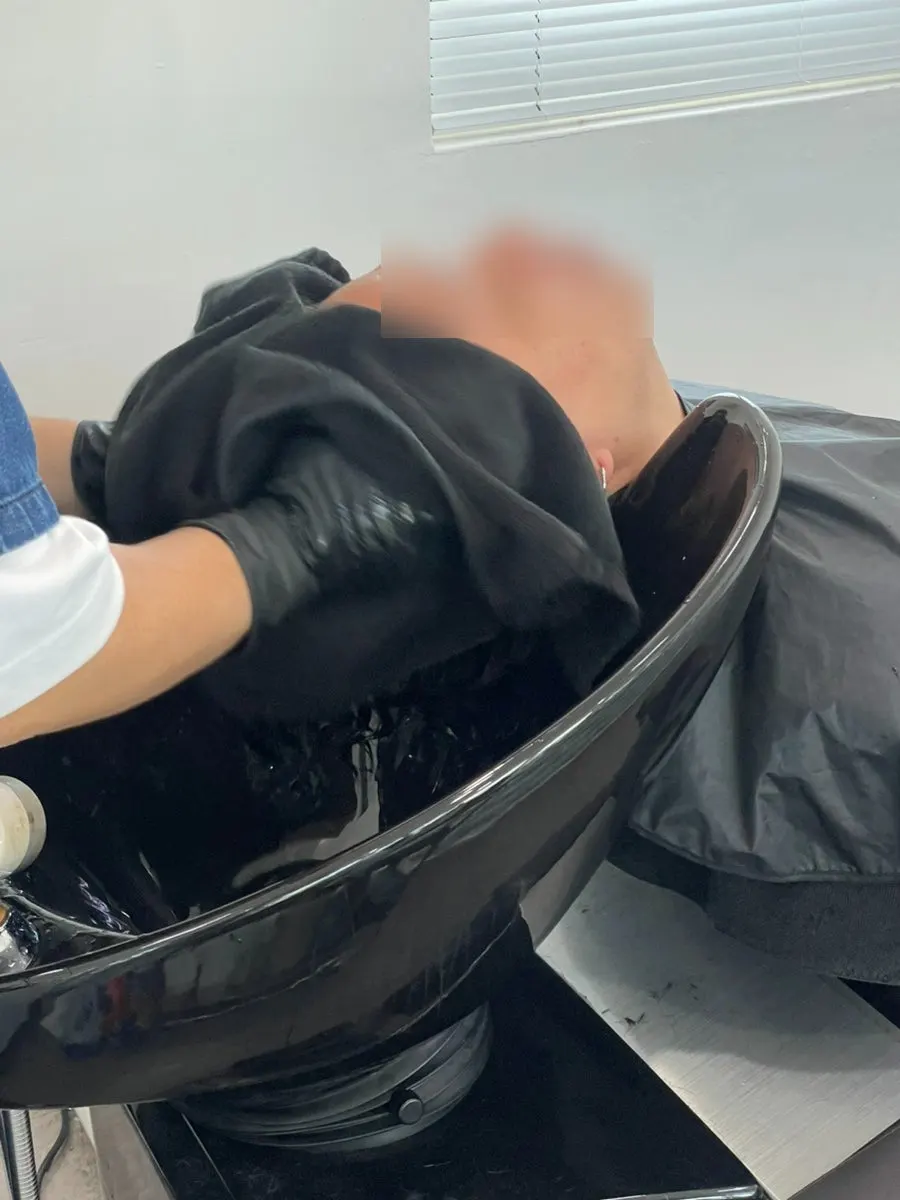 Black dye being applied