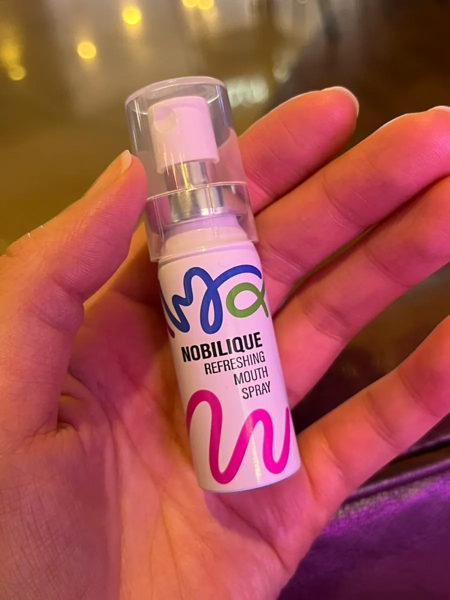 Spearmint oral spray carried and used on the go