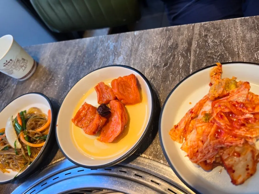 Yukhoe plate placed next to the charcoal-grilled ribs