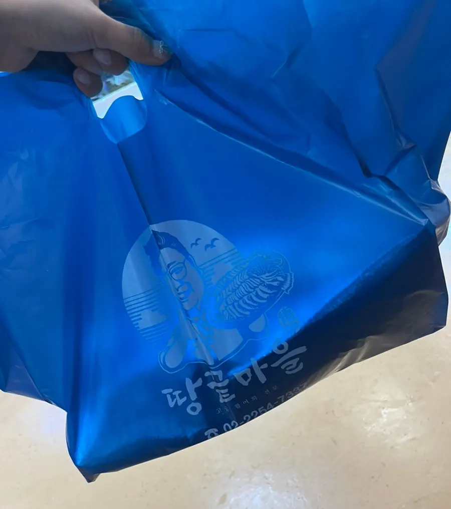 Sashimi takeout bag with chopsticks included
