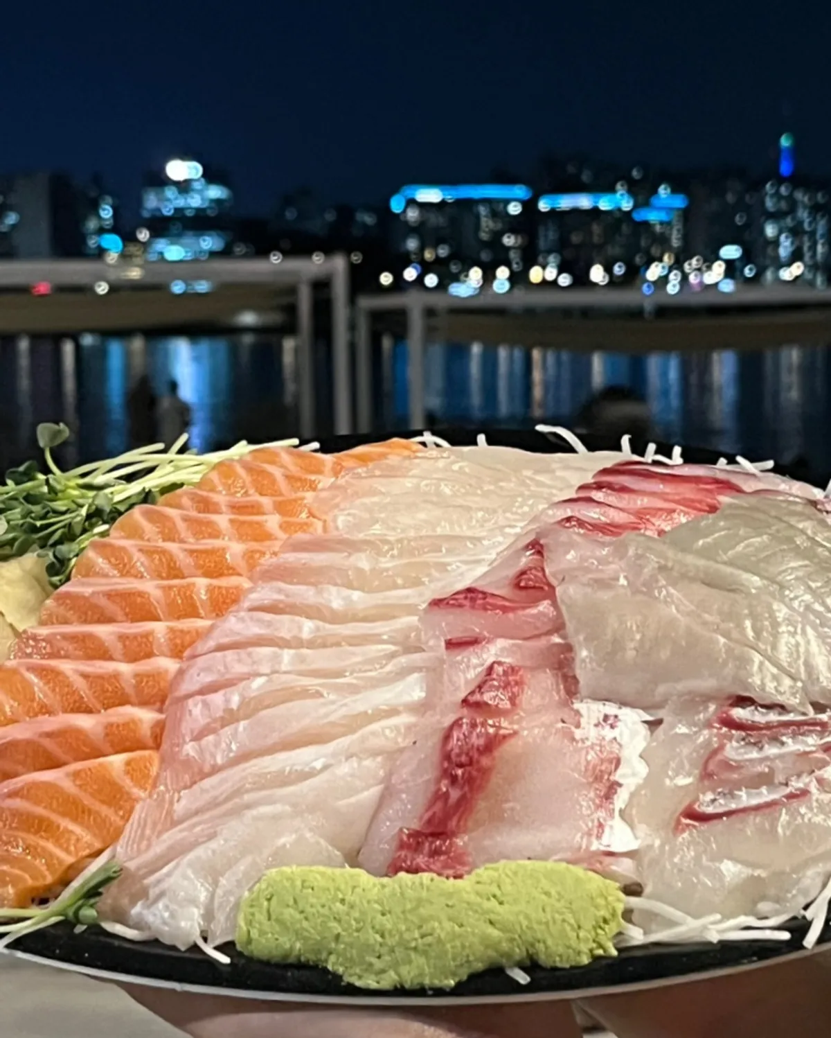 Assorted sashimi with Han River ramyeon and canned beer