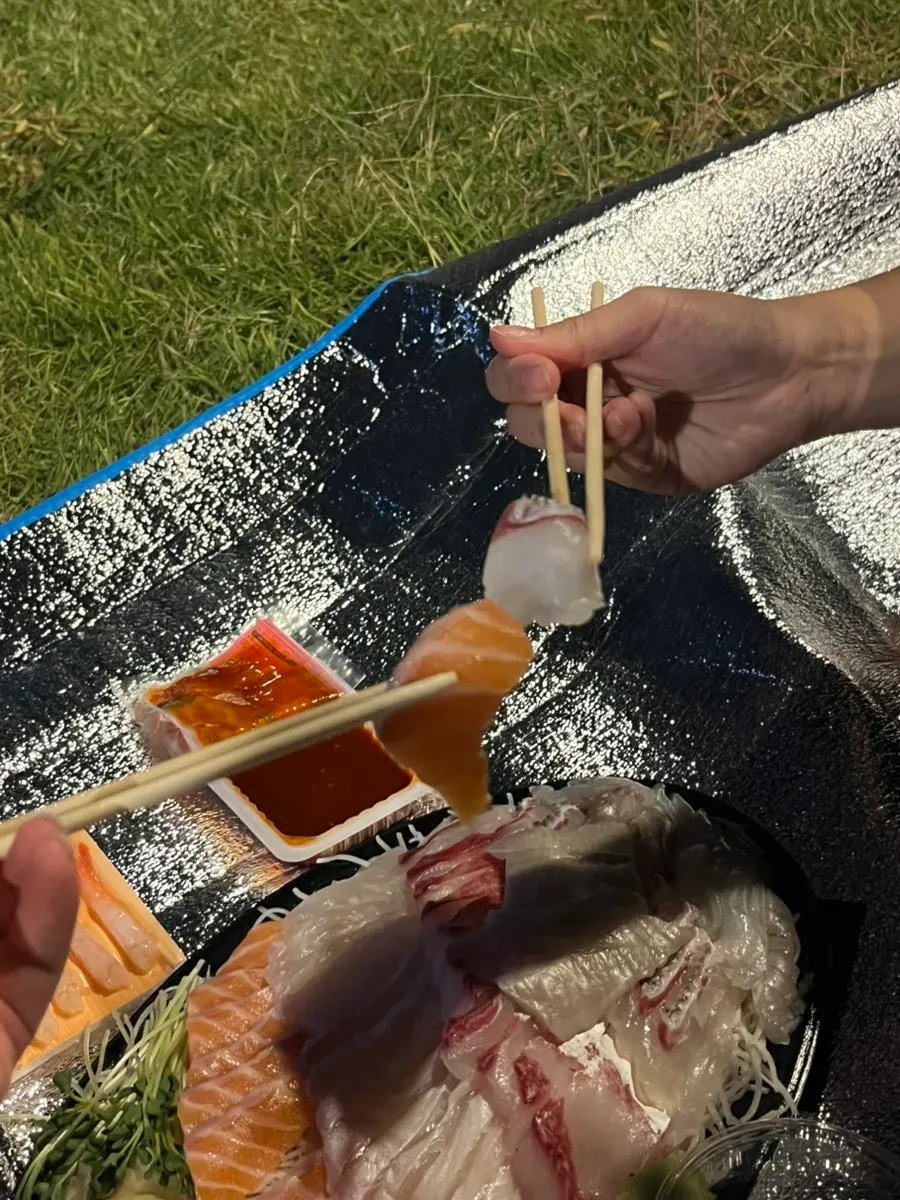 A plate of thickly cut assorted sashimi