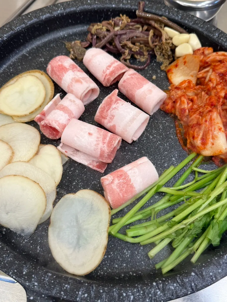 Shaved pork belly on the grill