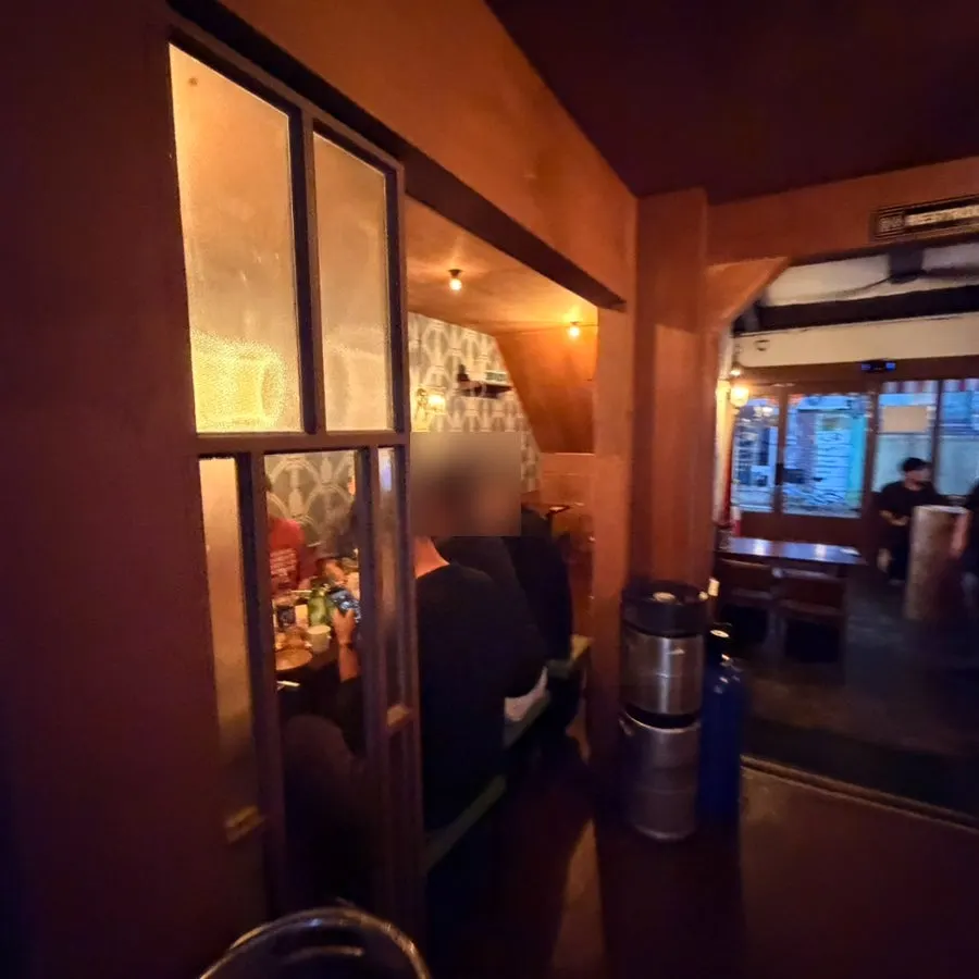 View of seating further inside Nogari Superette
