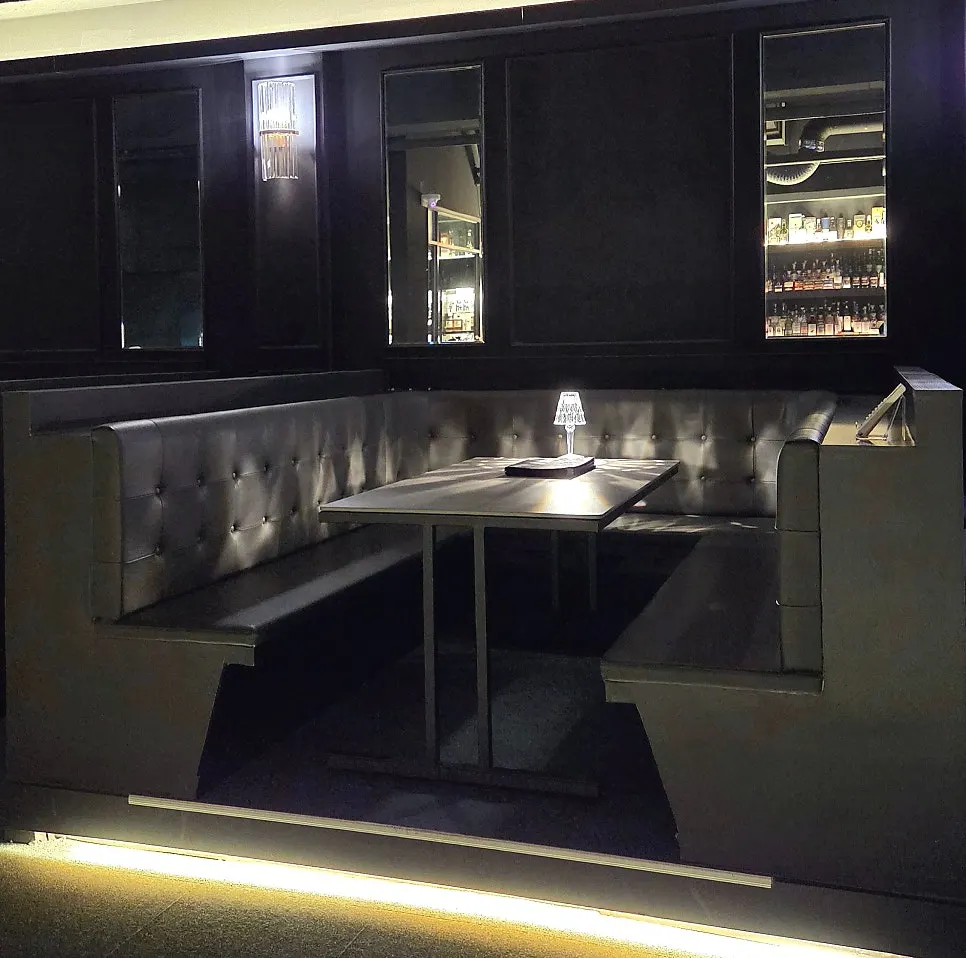 Sofa table area across from the bar table