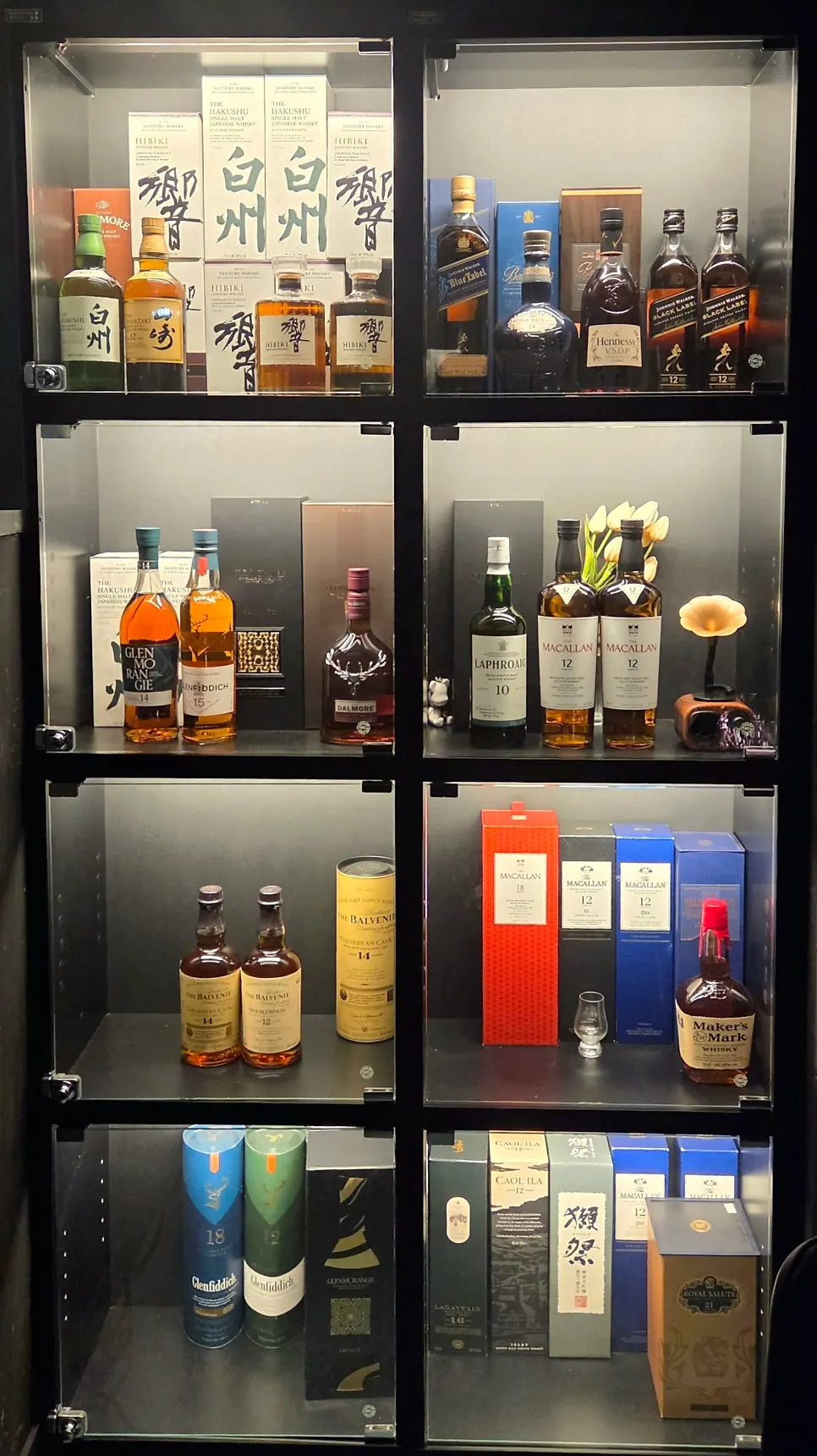 View of spirits displayed inside Noir Lacquer Verre