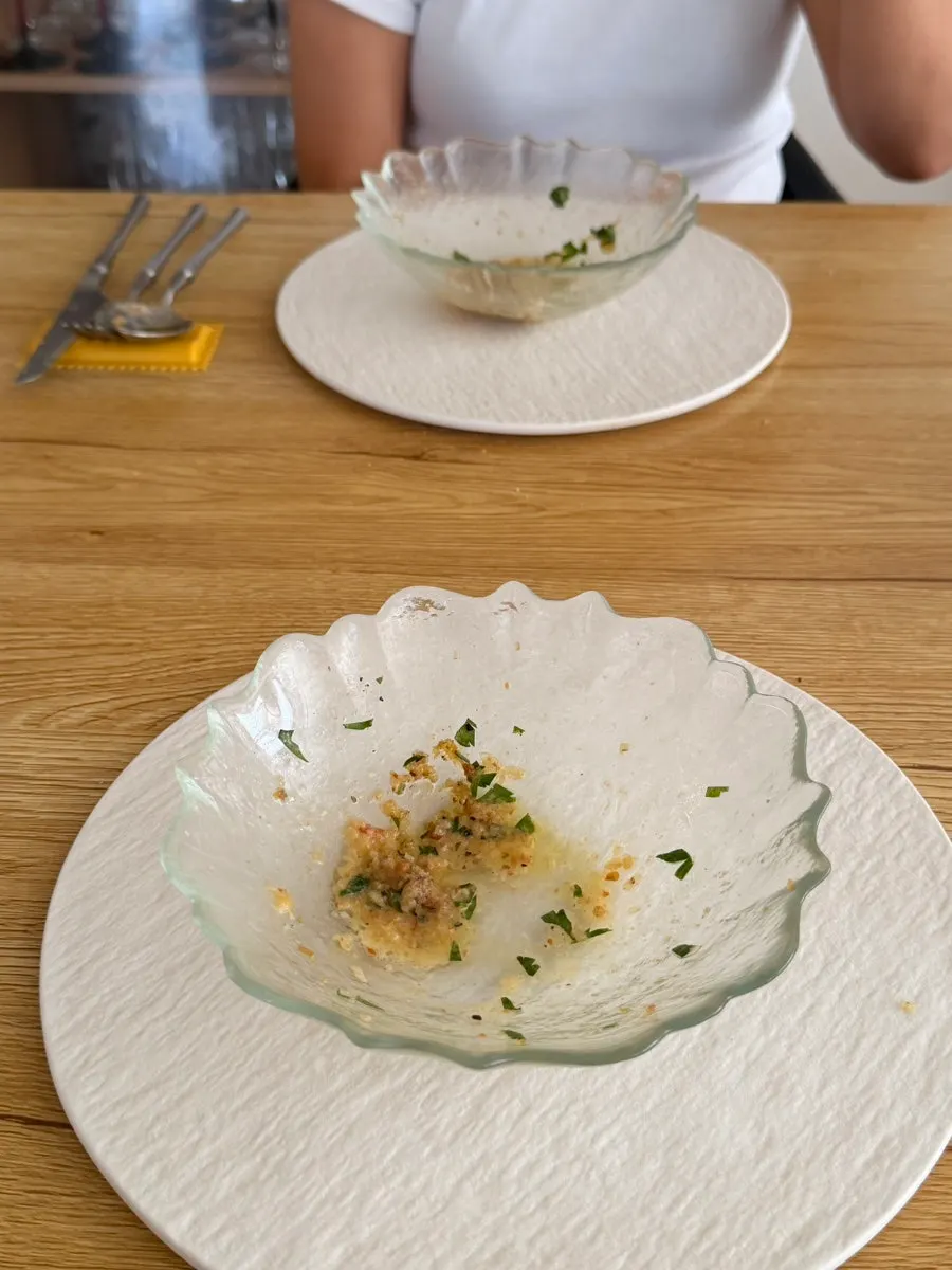 An emptied plate of pasta at Noju