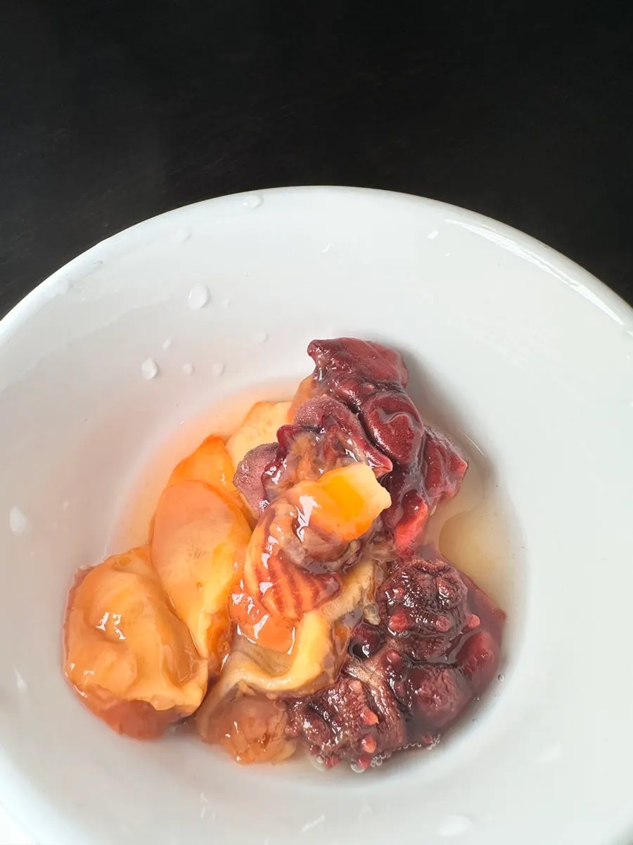 Plump orange-fleshed sea squirt served as a free side