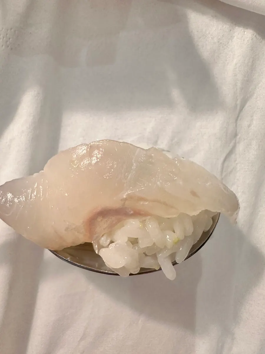 Spoon nigiri with flounder sashimi over chodaeribap