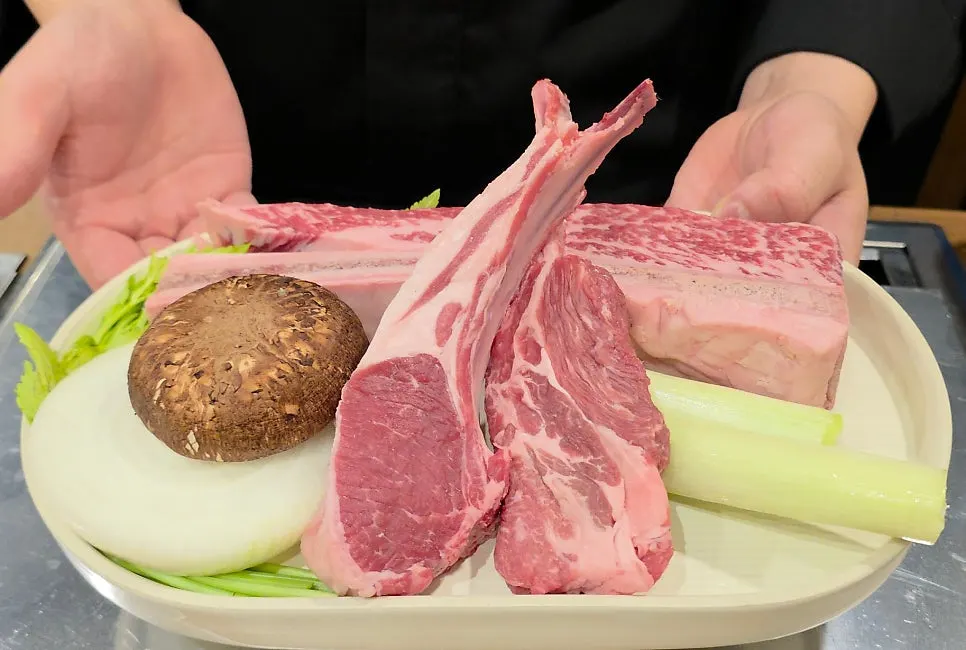 Beef-and-lamb set for two with aged raw short rib, French rack, and shoulder rack