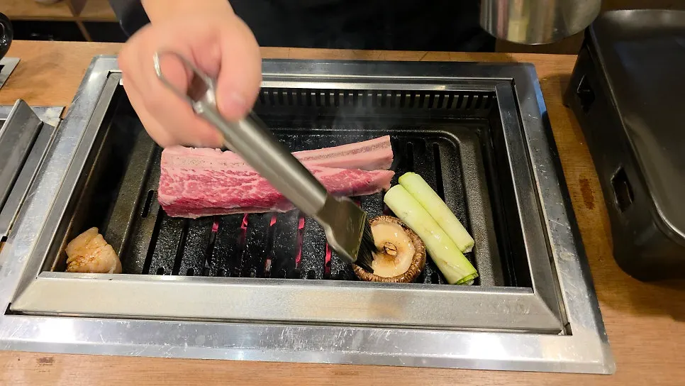 Aged raw short rib grilling on the plate
