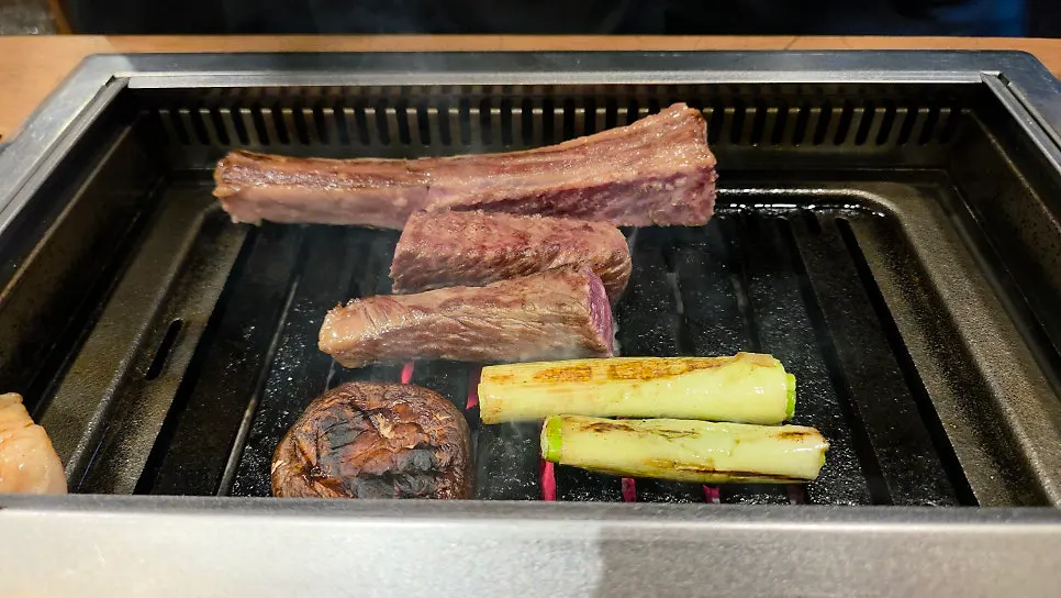 Aged raw short rib almost fully cooked