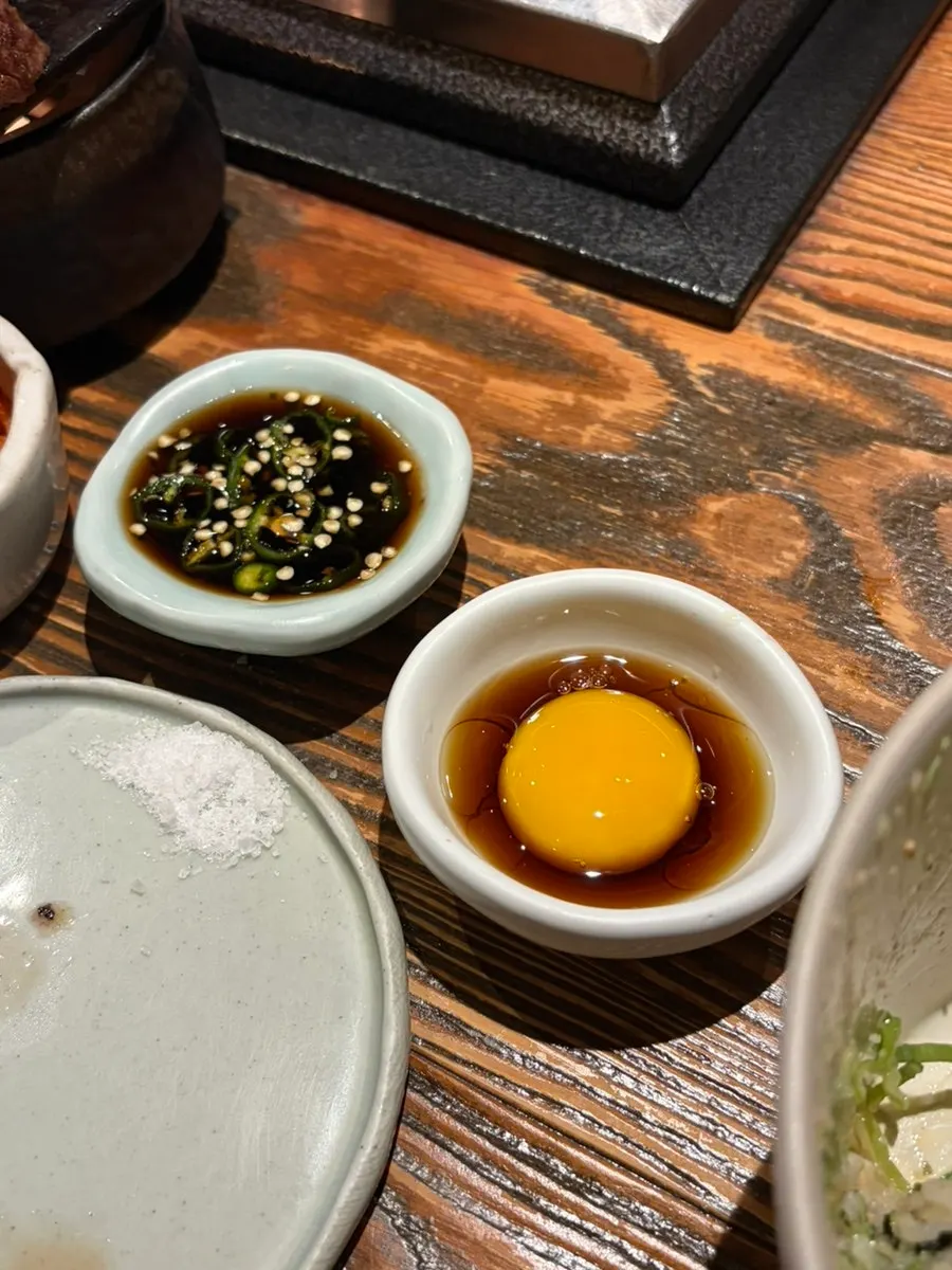 A plate of hand-ground salt and the house special sauce