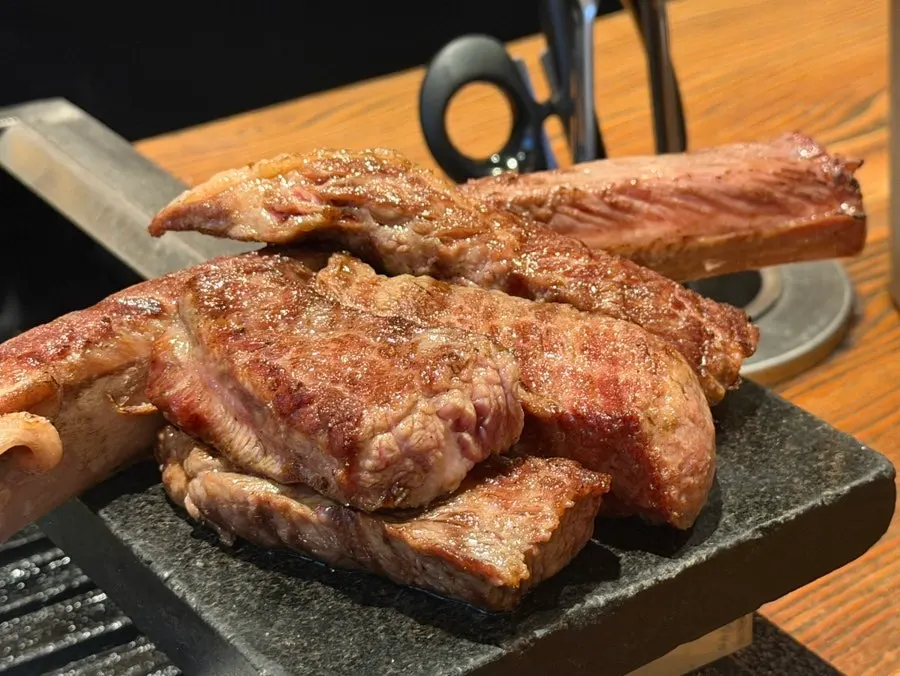Short rib on the grill with side dishes