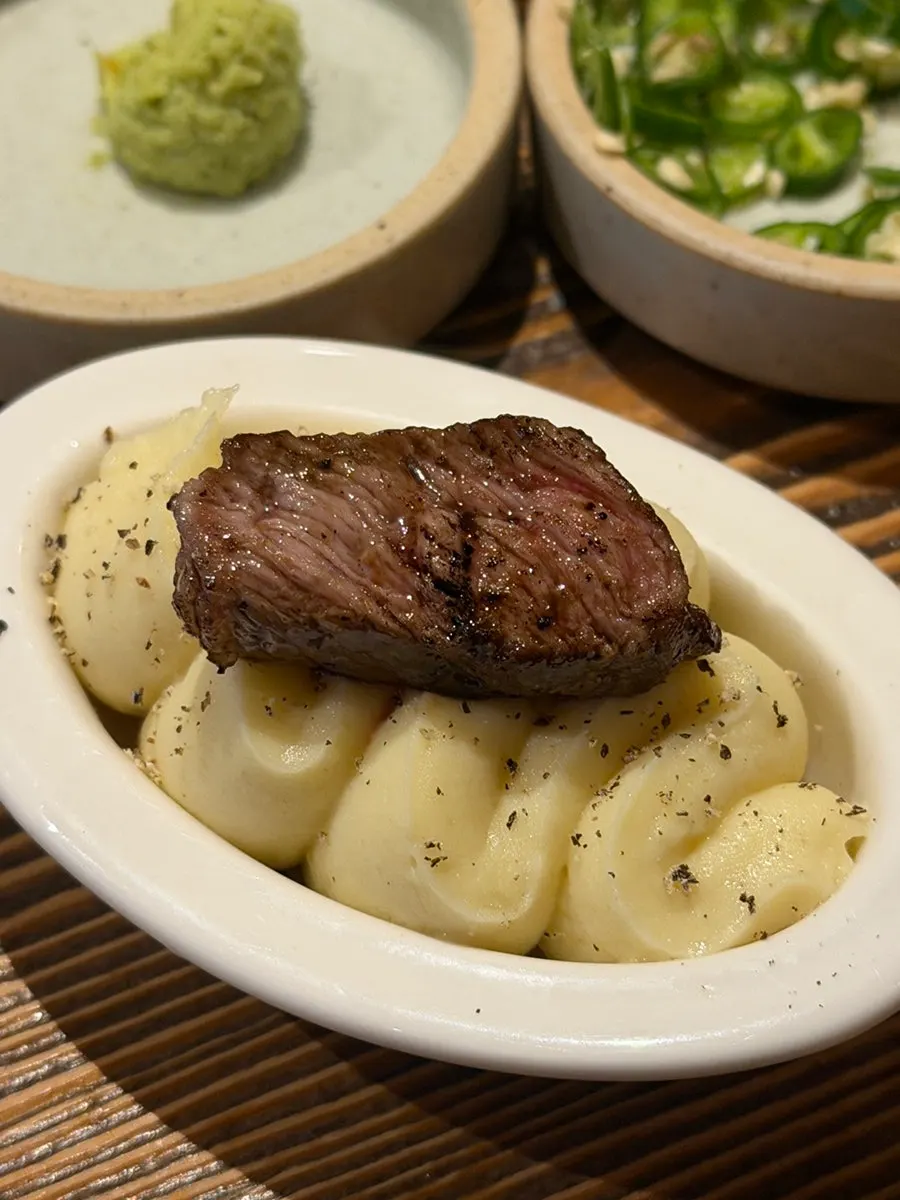 Potato purée and basil sauce served with the lamb