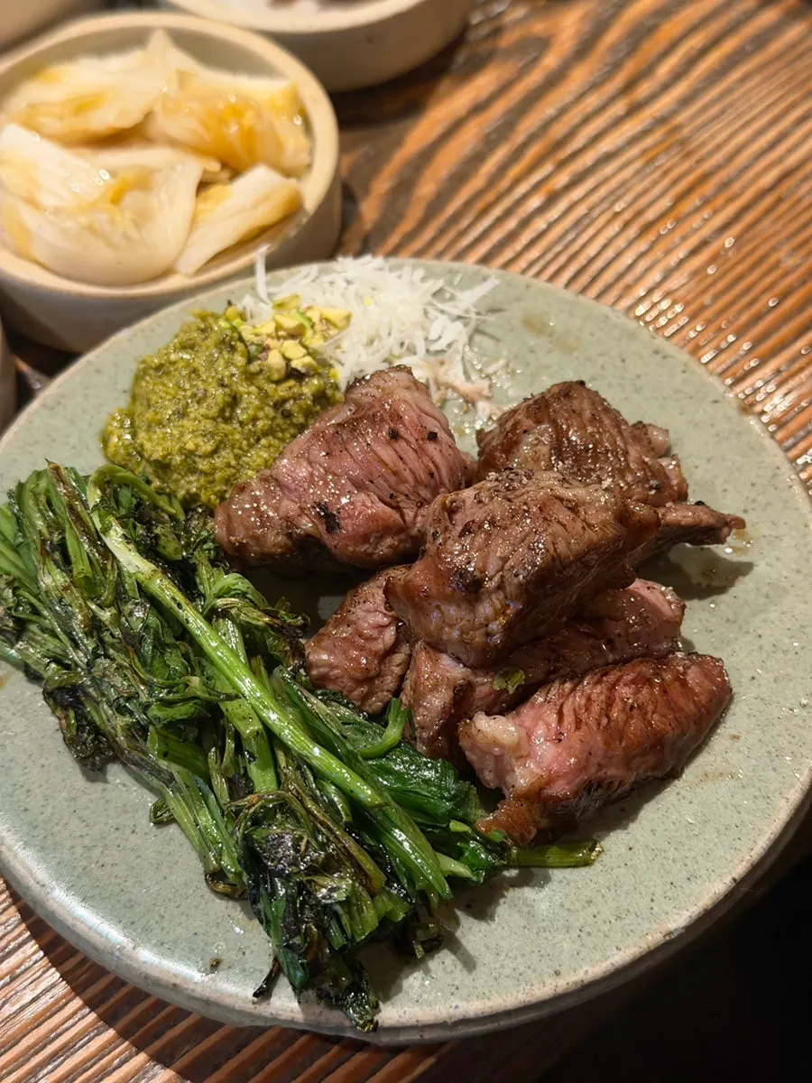 A piece of lamb with sauce