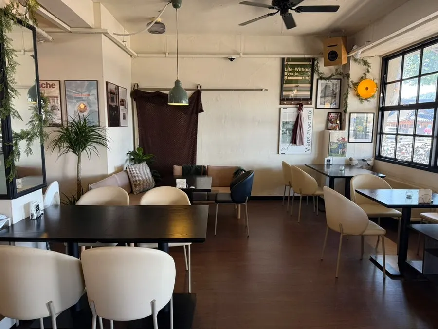 Seating area at Nonchalant Lounge with cozy lighting