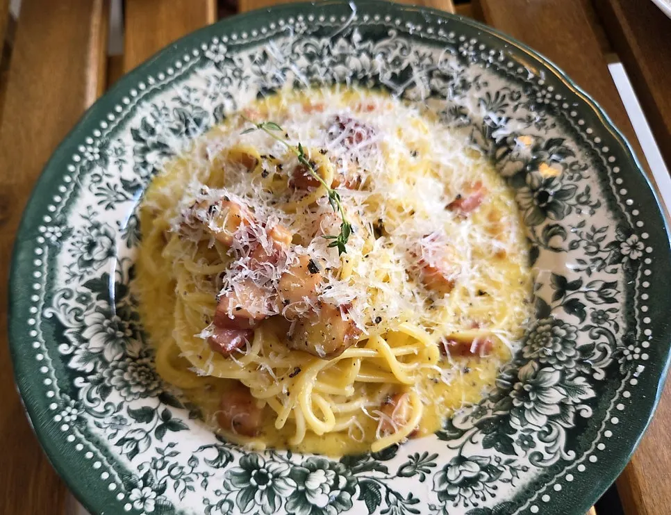 A plate of Nonchalant Lounge's classic carbonara