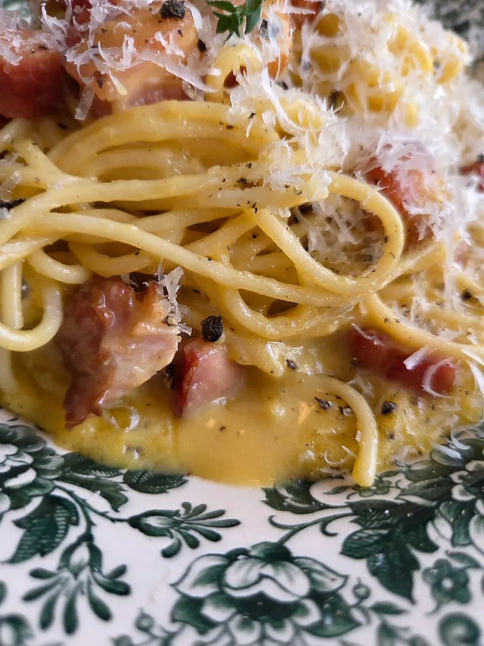 Thick sauce coating the carbonara noodles