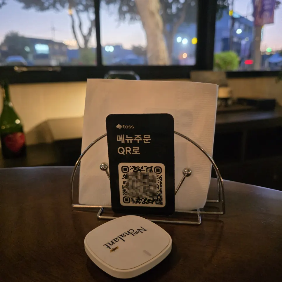 Table QR menu board at Nonchalant Lounge