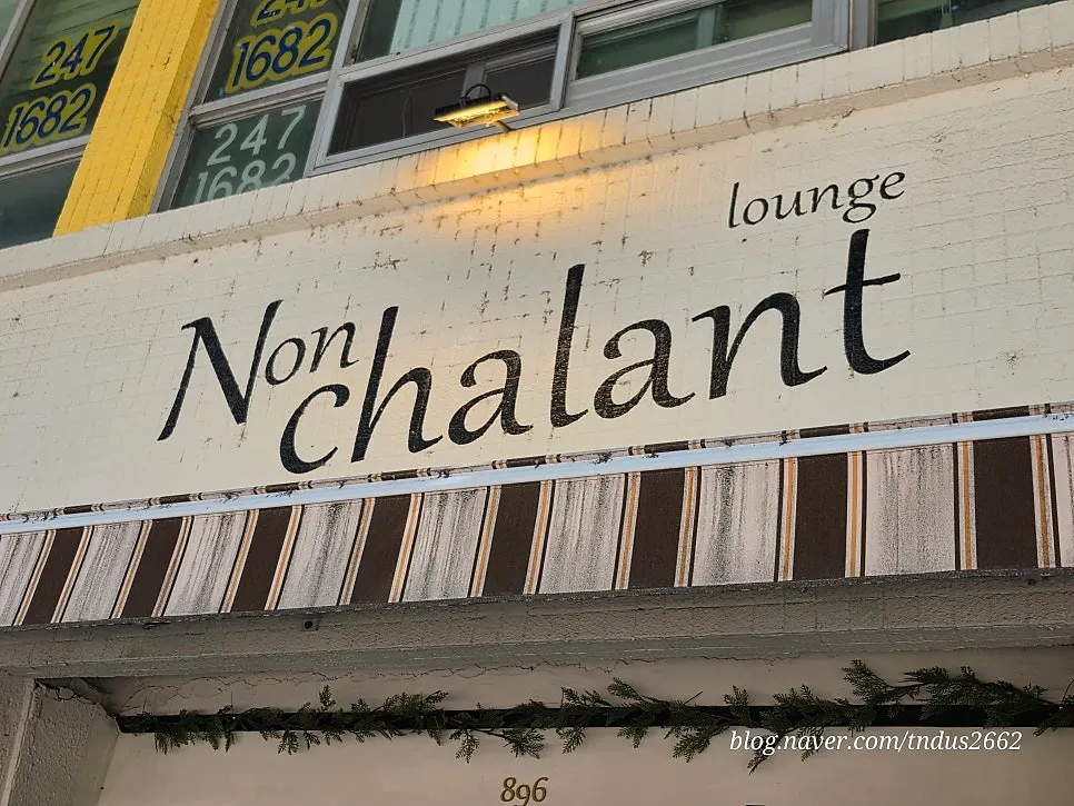 Exterior of Nonchalant Lounge in front of Jangan Gate