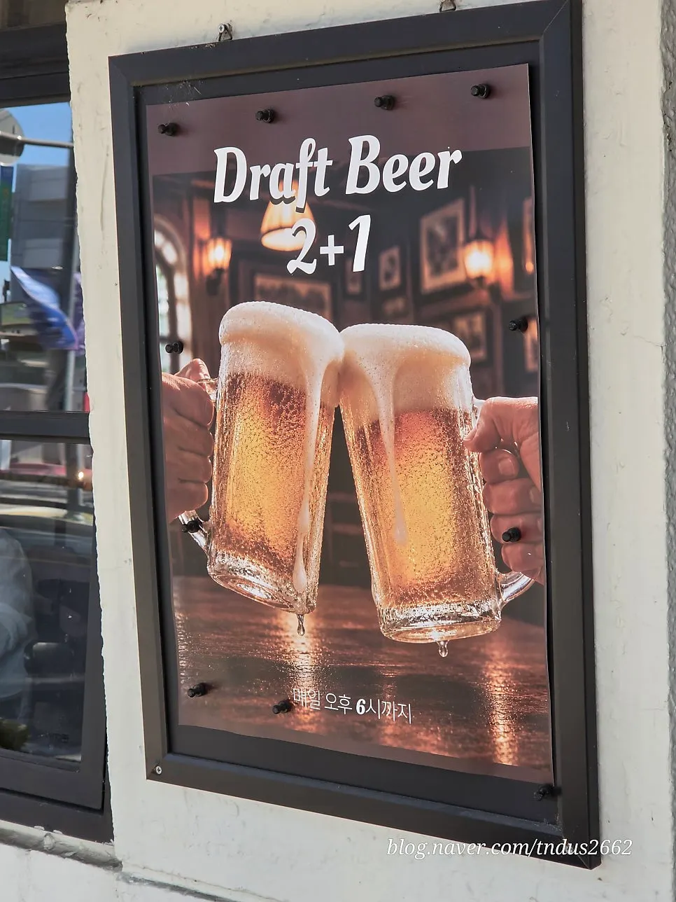 Menu board at Nonchalant Lounge