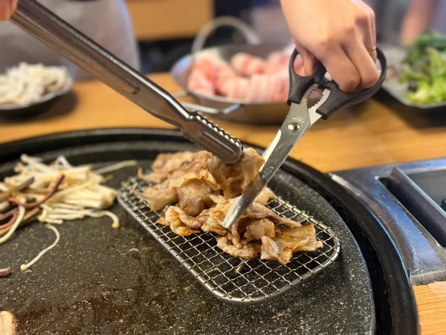 Thin-sliced pork belly slowly cooked over low heat