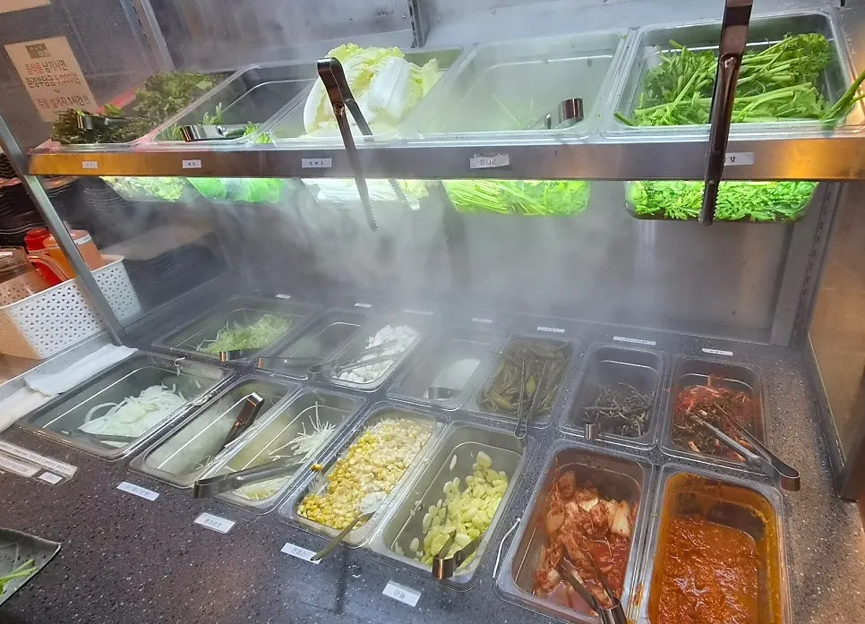 Self-serve bar with wrap vegetables and side dishes