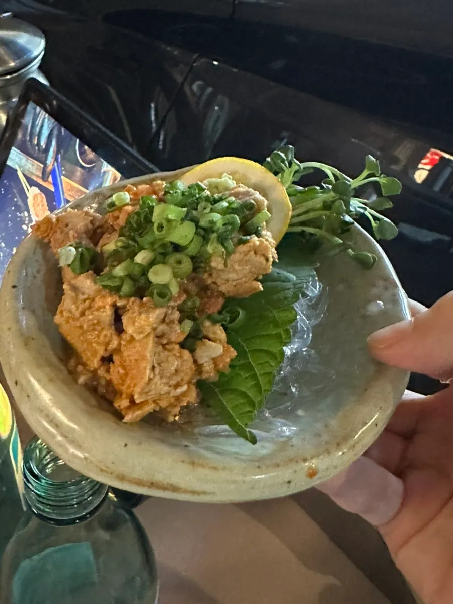 Izakaya dishes at an outdoor table