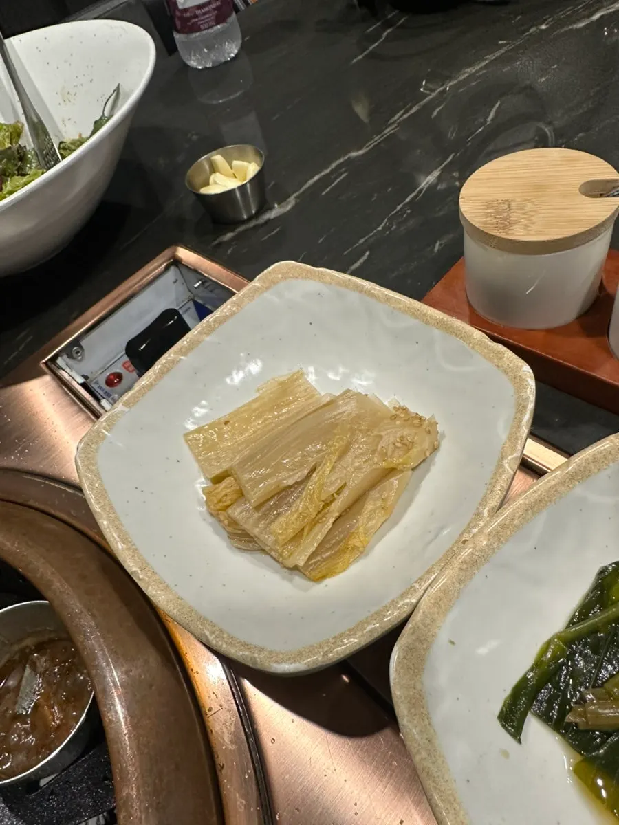 White kimchi and myeongi namul side dishes